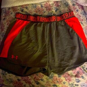 UNDER ARMOUR running shorts, pink and dark grey, size medium, little to no wear